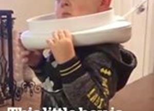 3-year-old boy gets a potty stuck on his head